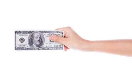 Woman hand with dollars isolated on white backgroundの写真素材