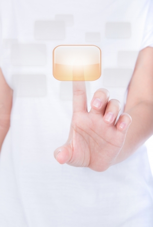 Woman hand  simulating pressing a button over body isolated on background.の写真素材