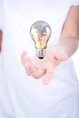 Woman hand hold fire bulb over bodyの写真素材