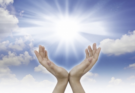 hand sun and blue sky with copyspaceの写真素材
