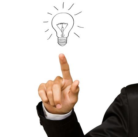 Business man hand drawing light bulb isolated on whiteの写真素材
