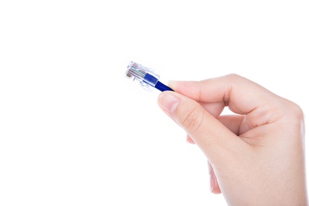 Woman holding LAN cordの写真素材