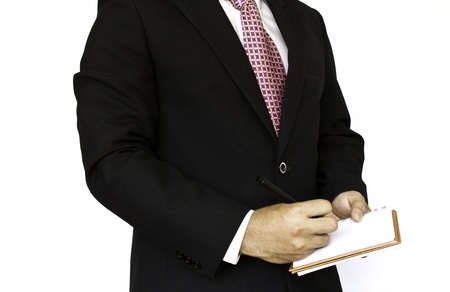 Business man writing and doing paperworkの写真素材