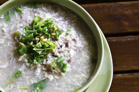 Rice soup on table
