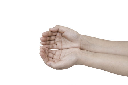 Beautiful woman hands with french manicure isolated on white background.の写真素材