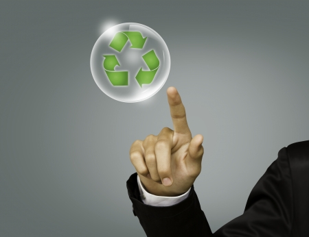 Eco concept : Business hand point recycling symbol in bubbleの写真素材