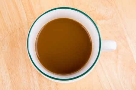 Coffee cup on the wooden tableの写真素材