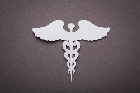 Medical background, Paper cut of Caduceus medical symbol with copy space for text or designの写真素材