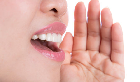 Yelling woman mouth close up isolated on white background