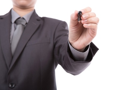 Businessman writing on copy space against white backgroundの写真素材