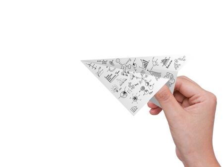 Hand hold Graph Paper plane isolated on whiteの写真素材