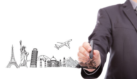 Businessman drawing  World travel (Japan,France,Italy,New York,India,egypt)の写真素材