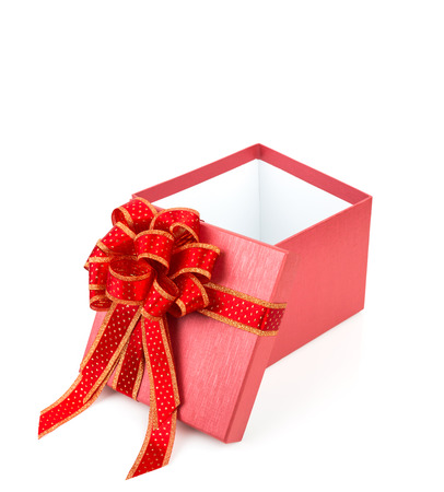 Red gift box with red and glod  ribbon on white backgroundの写真素材