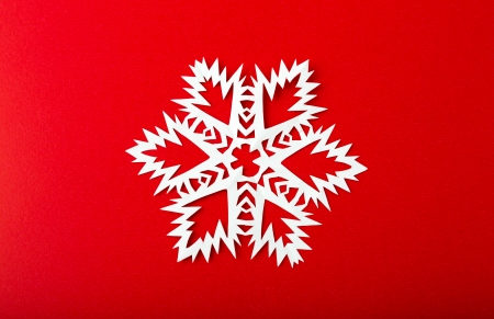 Vintage Christmas postcard with true paper snowflakesの写真素材