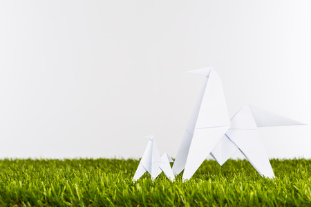Origami horse on grassの写真素材