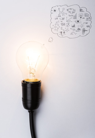 Light bulb with drawing graphの写真素材