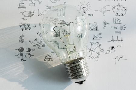 Light bulb with drawing graphの写真素材