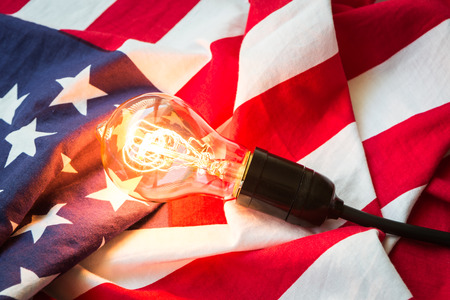 Light bulb on USA flagの写真素材