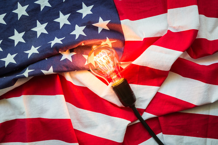 Light bulb on USA flagの写真素材