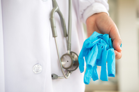 Doctor hand with  glovesの写真素材