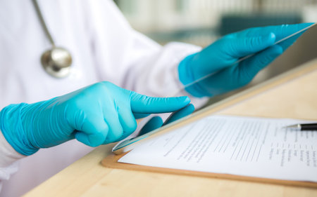 Doctor using tablet computerの写真素材