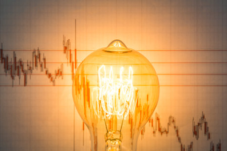 Light bulb with business graphの写真素材