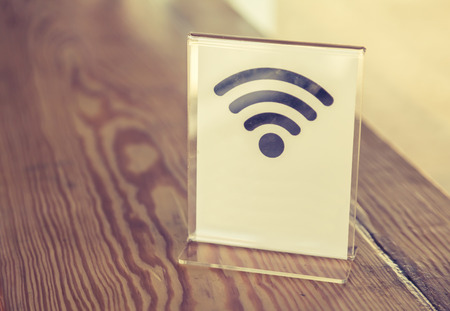 Free Wifi sign on tableの写真素材