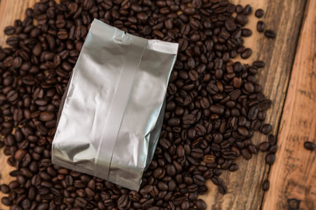 New coffee foil bag on wood tableの写真素材