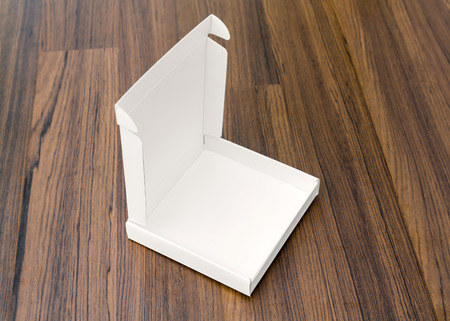 Blank white box mock up on wood backgroundの写真素材