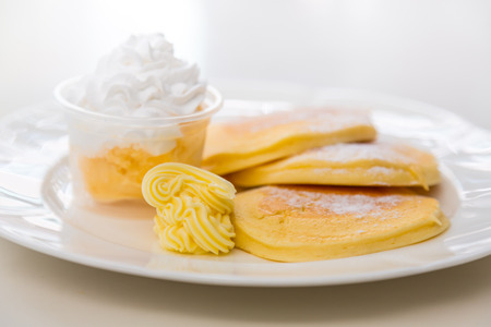 Pan cake with ice cream on tableの写真素材