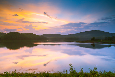 Beautiful sunset in the lake ( Filtered image processed vintage effect. )の写真素材