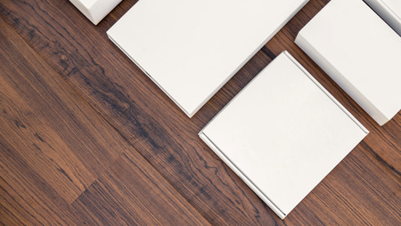Blank white box mock up on wood backgroundの写真素材