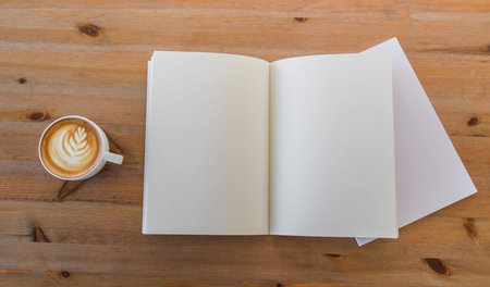 Blank catalog, magazines,book mock up on  wood background with cup of coffeeの写真素材