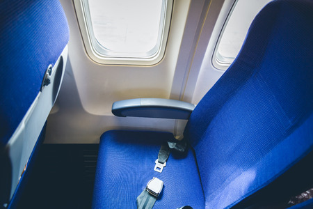 Seat belt in airplane  ( Filtered image processed vintage effect. )の写真素材