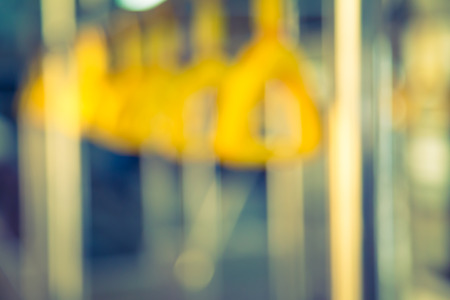 Abstract blur  Handles passenger inside a bus.  ( Filtered image processed vintage effect. )の写真素材