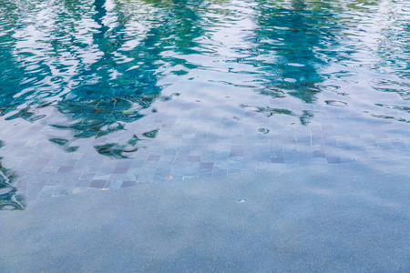 Swimming pool rippled waterの写真素材