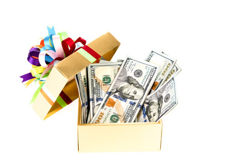 One hundred dollars banknotes in decorated gift box.