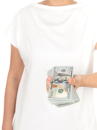 Hand with dollars isolated on white backgroundの写真素材