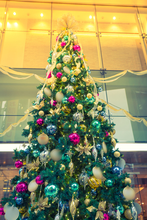 Closeup of Christmas tree decorations background ( Filtered image processed vintage effect. )の写真素材