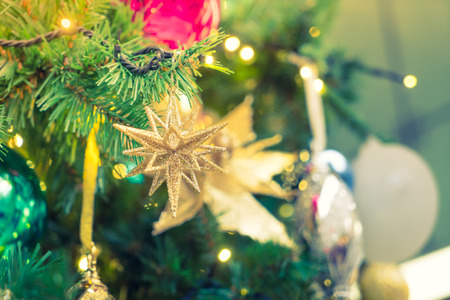 Closeup of Christmas tree decorations background ( Filtered image processed vintage effect. )の写真素材