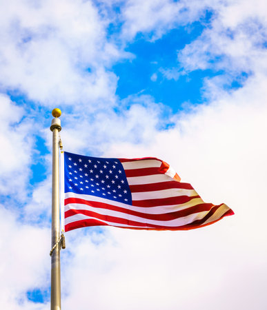 American flag on blue sky