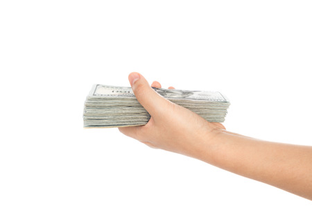 Hand with dollars isolated on white backgroundの写真素材