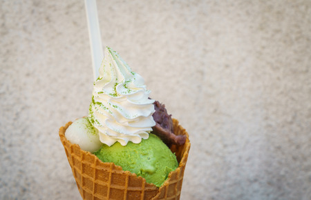 Green tea ice cream with coneの写真素材