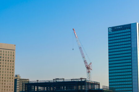 Crane and building construction site