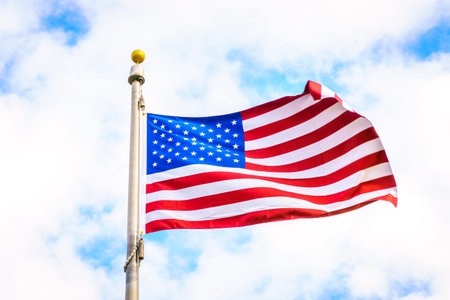 American flag on blue sky