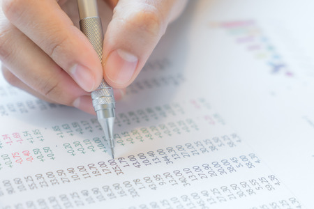 Hand write on Various financial charts on the tableの写真素材