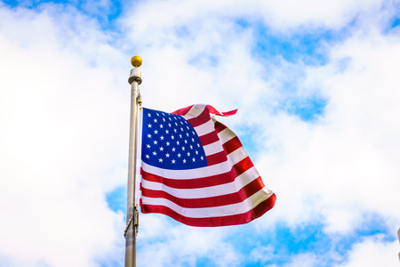 American flag on blue skyの写真素材