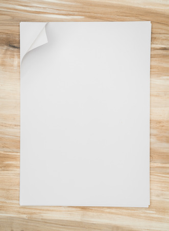 Real Paper Corner Fold on wood backgroundの写真素材