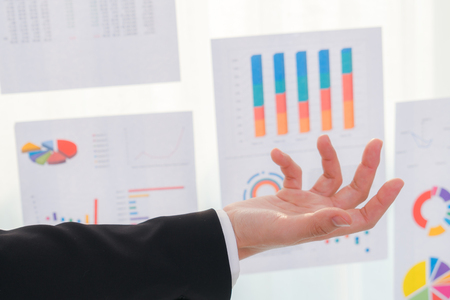 Business people  with finance chartの写真素材