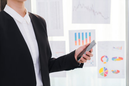 Business people using laptop  and Financial charts  at meeting officeの写真素材